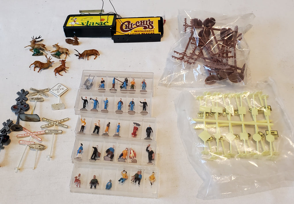 Lot of HO people, Railroad signs, telephone poles, deer