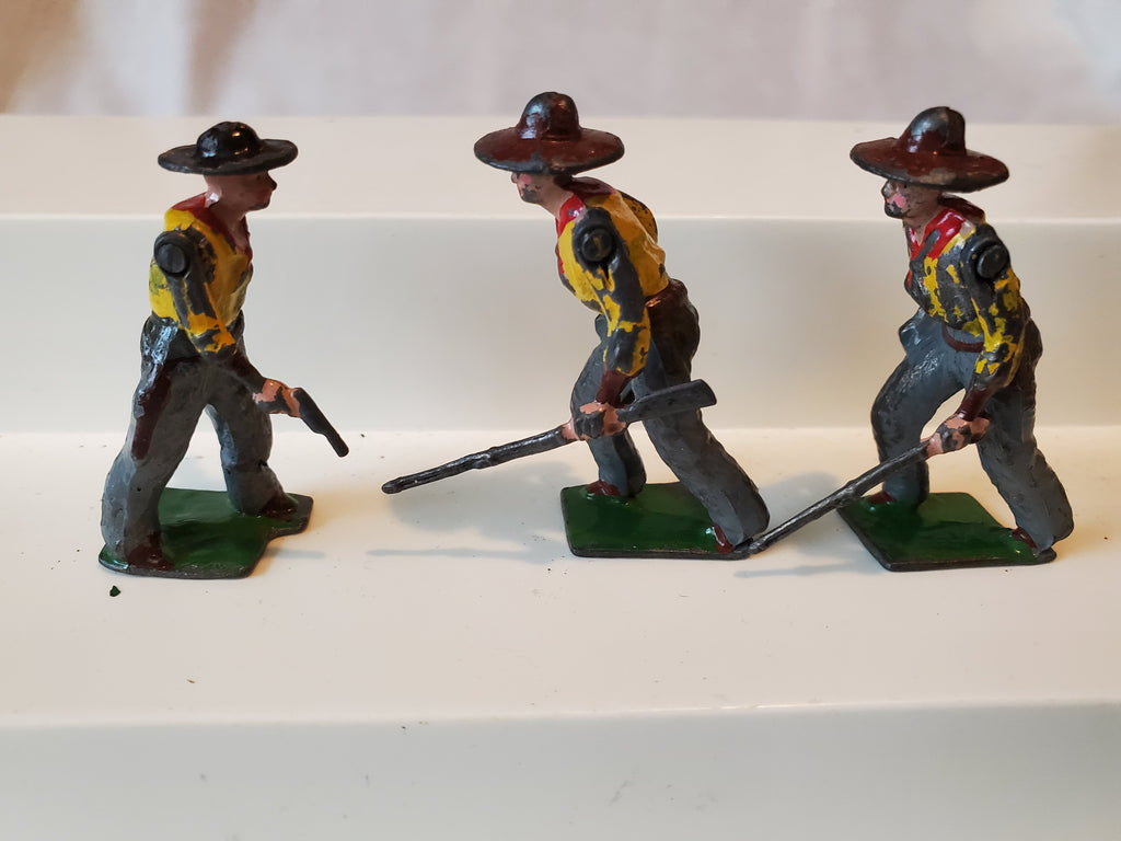 Britains 3 Cowboys, lead figurines