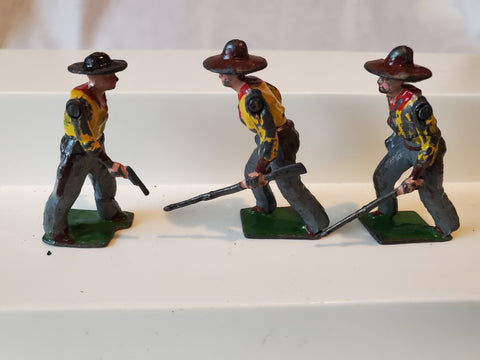 Britains 3 Cowboys, lead figurines