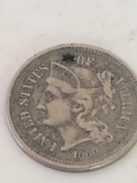 1866 US 3 cent nickel with star hole