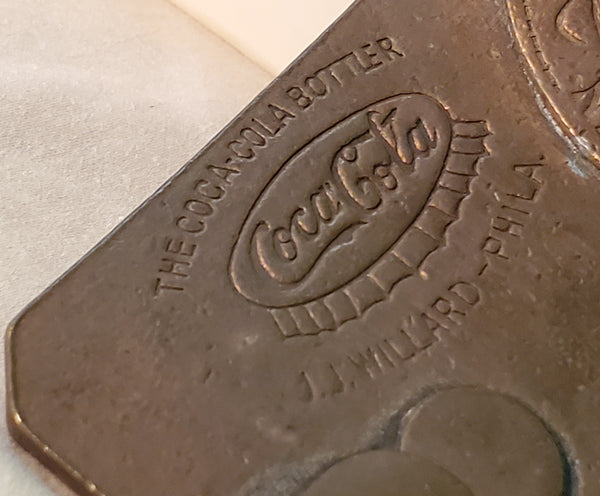 Pair of brass Coca-Cola belt buckles