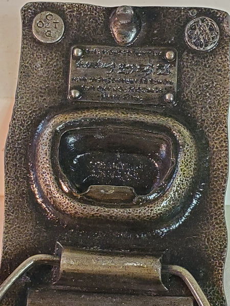 Pair of brass Coca-Cola belt buckles