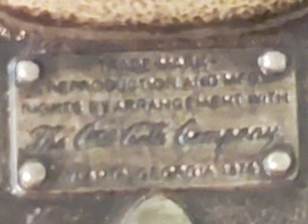 Pair of brass Coca-Cola belt buckles