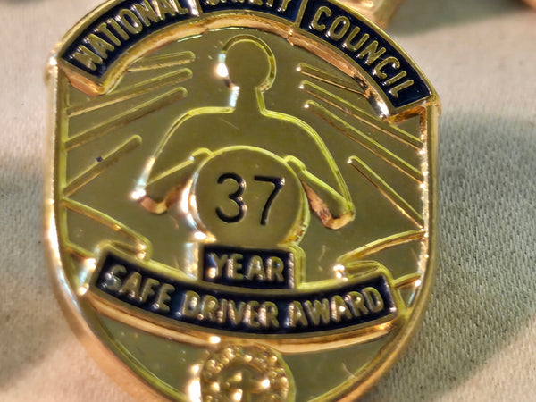 Lot of 18 National Safety Council Safe Driver pin & screw back Awards