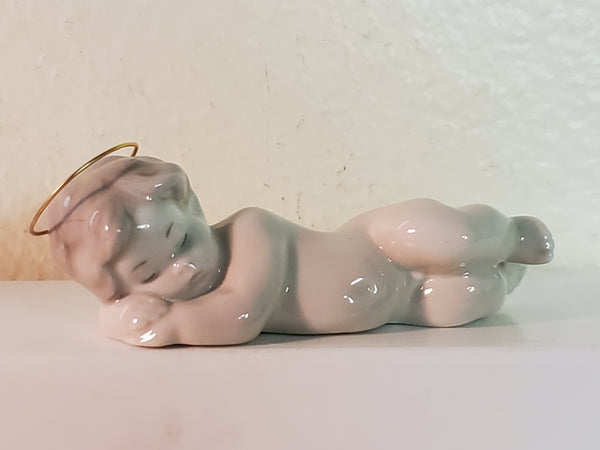 Lladro baby Jesus, sleeping, #4535 with halo