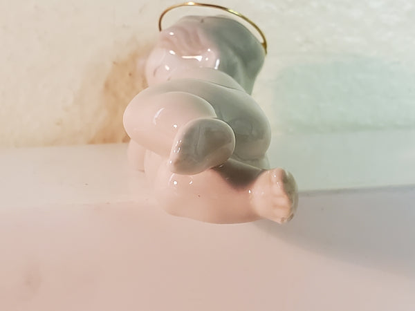 Lladro baby Jesus, sleeping, #4535 with halo
