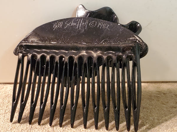 Pair signed Bill Schiffer hair combs, hand painted