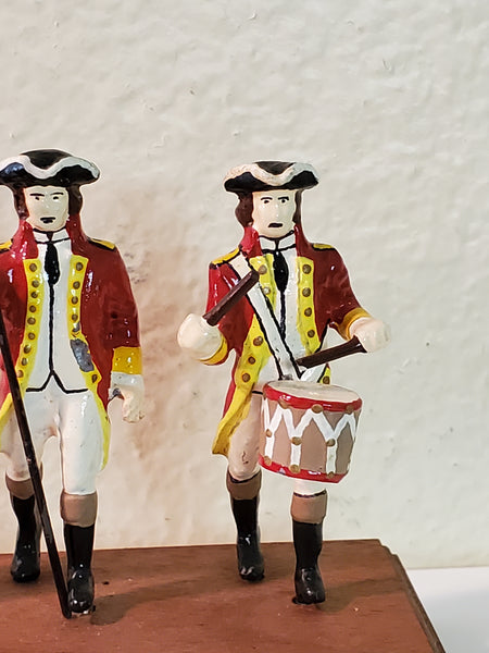 3 piece Redcoats marching band with flag, lead, Britians?