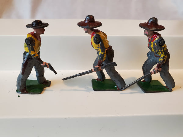 Britains 3 Cowboys, lead figurines