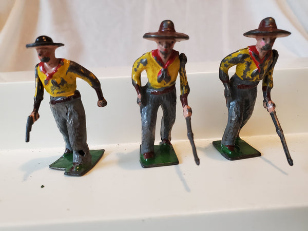 Britains 3 Cowboys, lead figurines