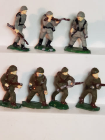 Lot of 7 WWII lead toy soldiers