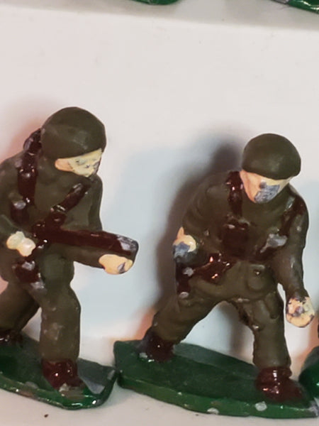 Lot of 7 WWII lead toy soldiers