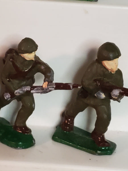 Lot of 7 WWII lead toy soldiers
