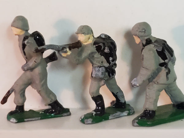 Lot of 7 WWII lead toy soldiers