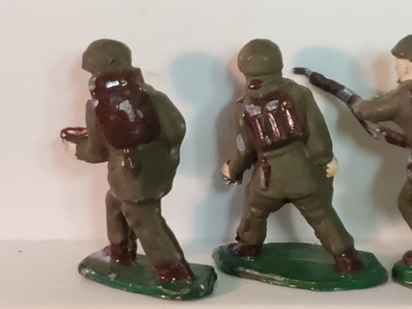 Lot of 7 WWII lead toy soldiers