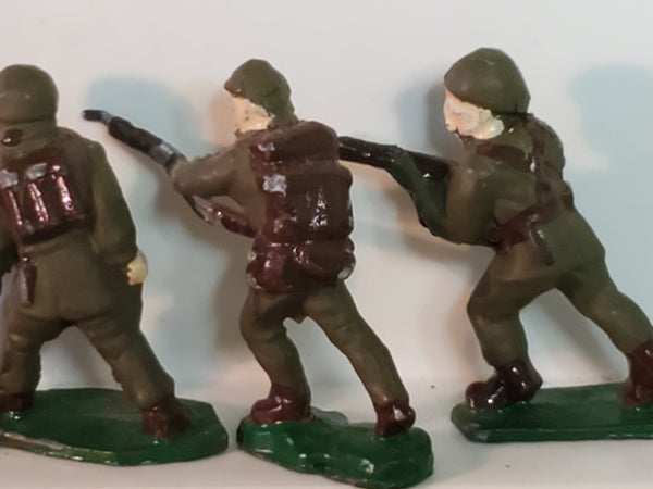 Lot of 7 WWII lead toy soldiers