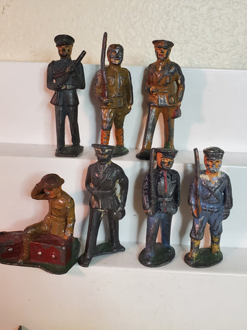 Lot of 7 WWII lead toy soldiers
