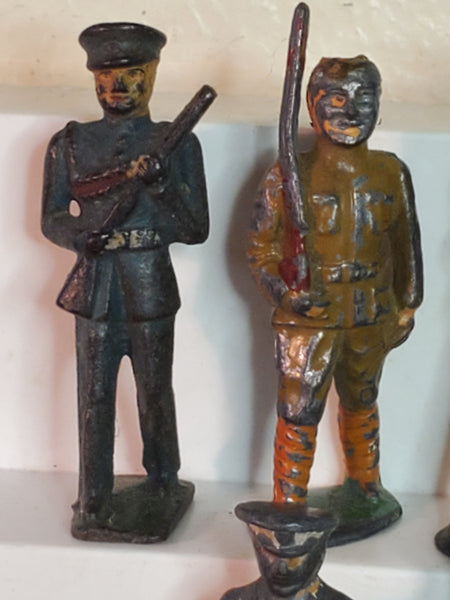 Lot of 7 WWII lead toy soldiers