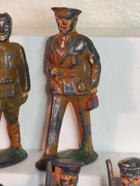 Lot of 7 WWII lead toy soldiers