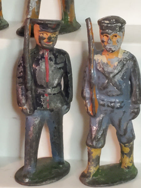 Lot of 7 WWII lead toy soldiers