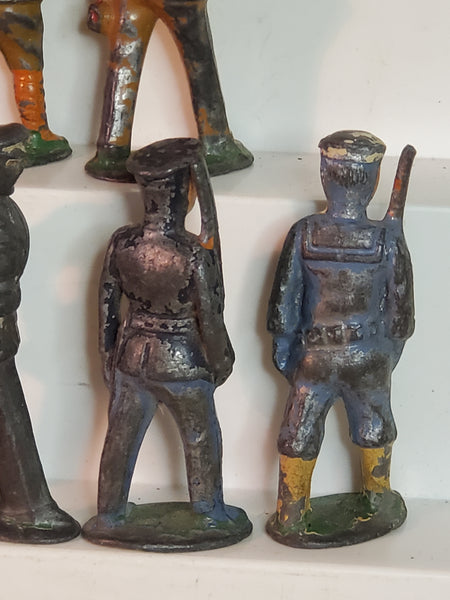 Lot of 7 WWII lead toy soldiers