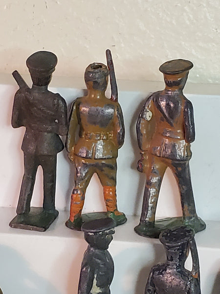 Lot of 7 WWII lead toy soldiers